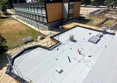 Interior Roofing large commercial roof installation underway